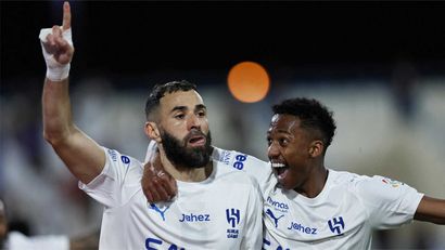 Benzema celebrates with Nasser Al Dawsari (©REUTERS/Hamad I Mohammed TPX IMAGES OF THE DAY)