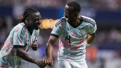 Doku and Lukebakio celebrate last night (©Dale Zanine-Imagn Images)