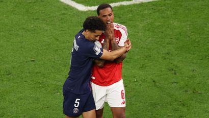 Marquinhos hugs and comforts Gabriel immediately after the missed penalty (©Richard Heathcote/Getty Images)