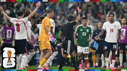 Referee Alireza Faghani sends Quansah off during the match against Mexico (©AFP)