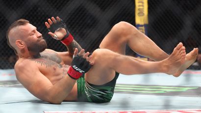 Conor McGregor on the ground (©Getty Images)