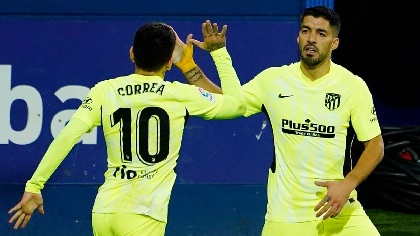 Luis Suarez celebrates first goal with Angel Correa (©Reuters)