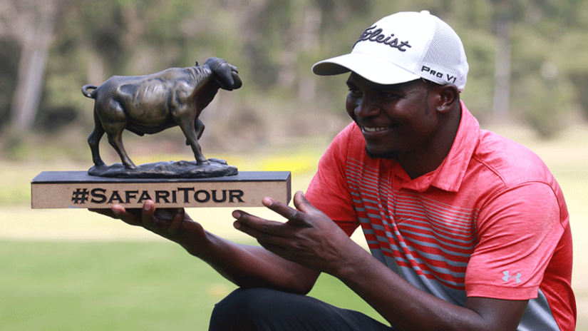 Robson Chinhoi displays his trophy after winning at Royal Nairobi: photo courtesy