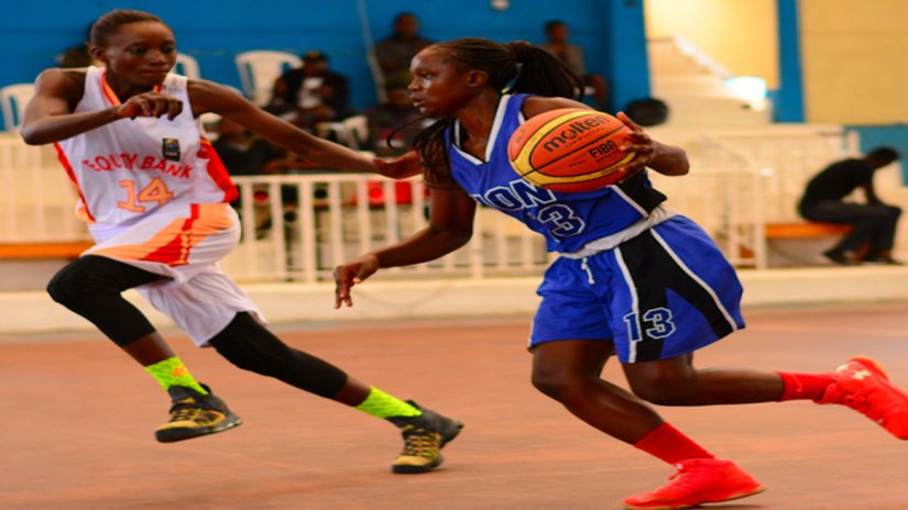 UON's Liz Okumu dribbles past Equity Bank's Linda Alando: Photo courtesy