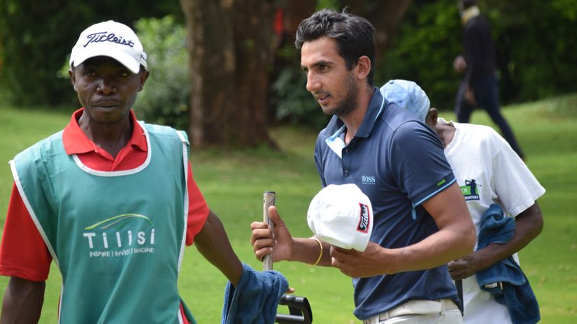 Mohit Mediratta with his caddie at the Muthaiga event