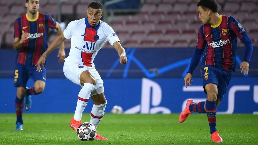 Kylian Mbappe in action against Barcelona ©AFP  
