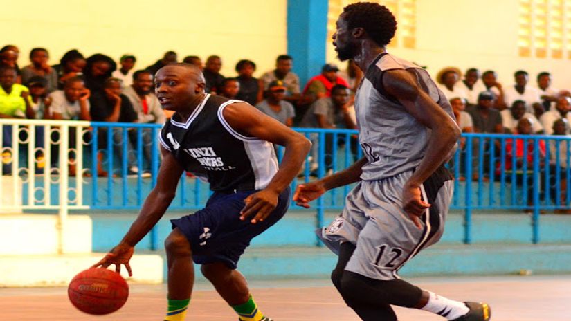 EMYBA's Eugene Adera guards Ulinzi's Eric Mutoro: photo courtesy 