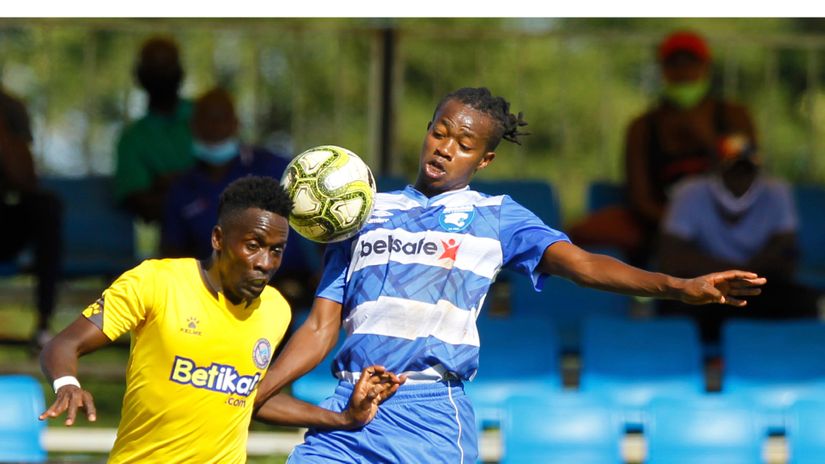 Peter Thiong'o and Titus Achesa battle for the ball in a past match 