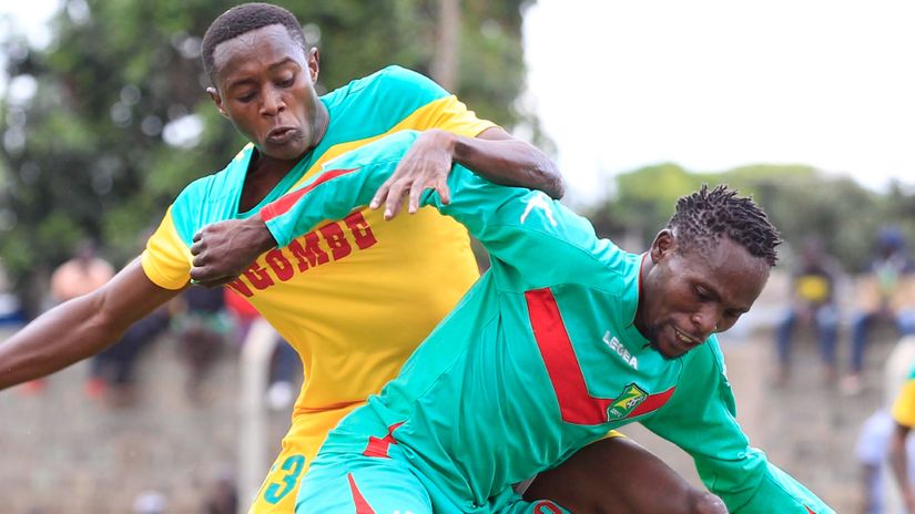 Mathare's John Mwangi battles for the ball with Zoo's Dominic Ouma ©