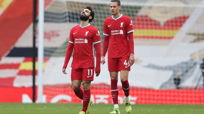 Desperate Salah and Rhys Williams (©AFP) 