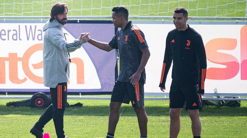 Pirlo, Alex Sandro and Cristiano Ronaldo at training (©AFP)