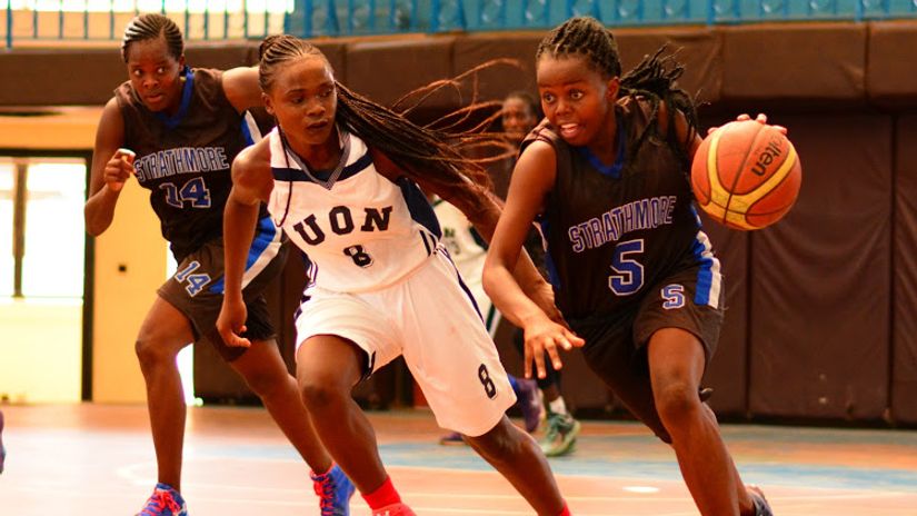 Dynamites' Liz Okumu (in white) in action at  past match