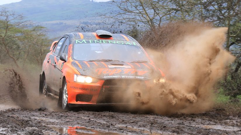 Carl Tundo navigated by Tim Jesop driving Mitsubishi Evolution 10 cruises through water during the ARC Safari Rally 2018 at Speres village in Soysambu farm 