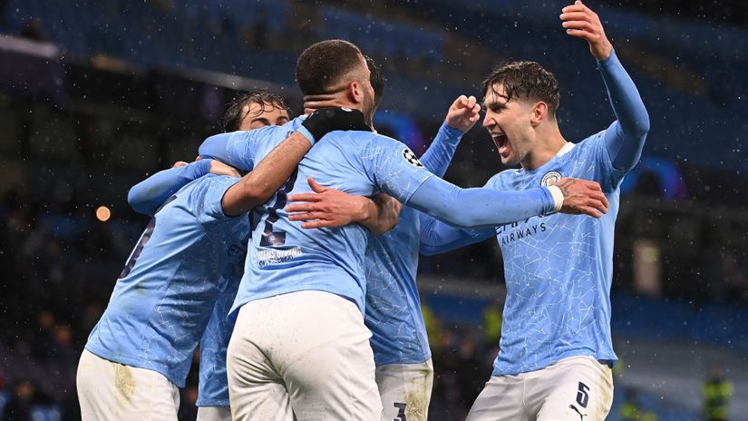 City players celebrate (©Laurence Griffiths/Getty Images)