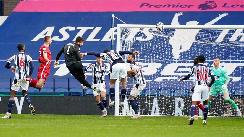 Alisson soars to score in the 95th minute for the win (©AFP)