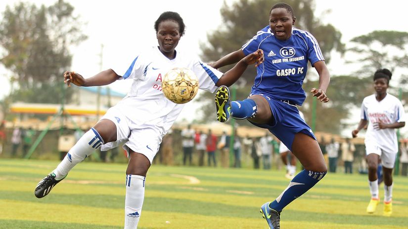 Judith Omukunde (L) of Wadadia FC contest for ball with Everlyn Naliaka of Gaspo FC during their Women Premier League match at Ruaraka sports ground in Nairobi on June 24, 2018.