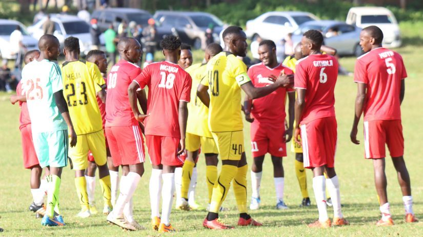 Marafiki FC and Tusker players exchange pleasantries at full time© Tusker