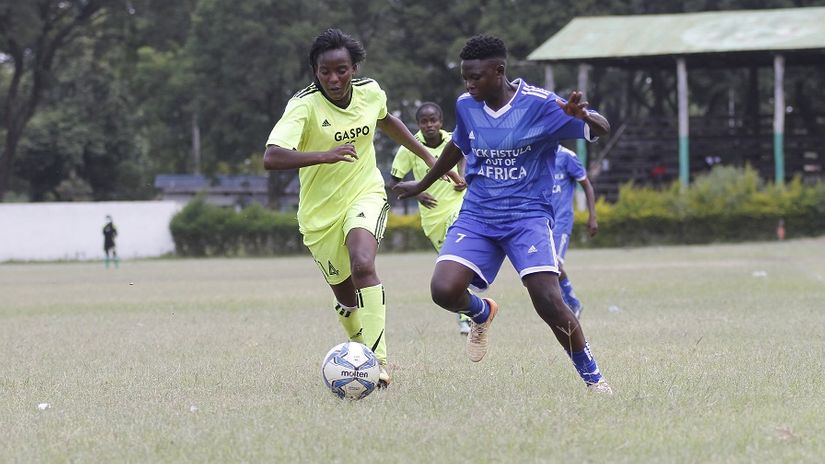 Gaspo's Elizabeth Wambui in action  against Wadadia's Monica Nyakowa