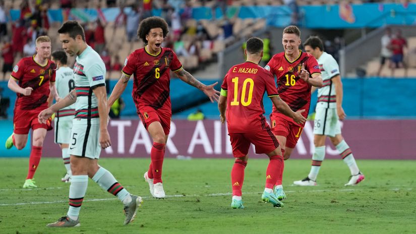 Hazard brothers and Witsel celebrate the only goal of the game (©Thanassis Stavrakis - Pool/UEFA via Getty Images)