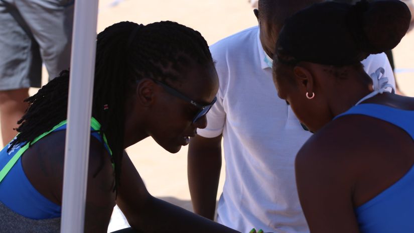 Gaudencia Makokha and Bracksides Agala bow down in prayer before a match © Courtesy 