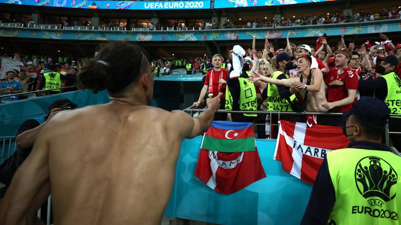 Yussuf Poulsen throws his shirt towards the fans (©Naomi Baker/Getty Images)