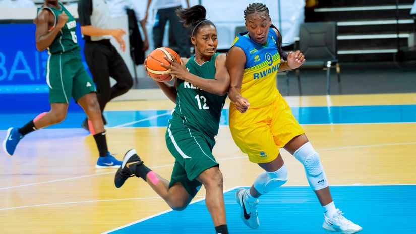 Lionesses' Rose Ouma shields the ball during Kenya's match against Rwanda in the women's Afrobasket Zone Five Qualifiers 