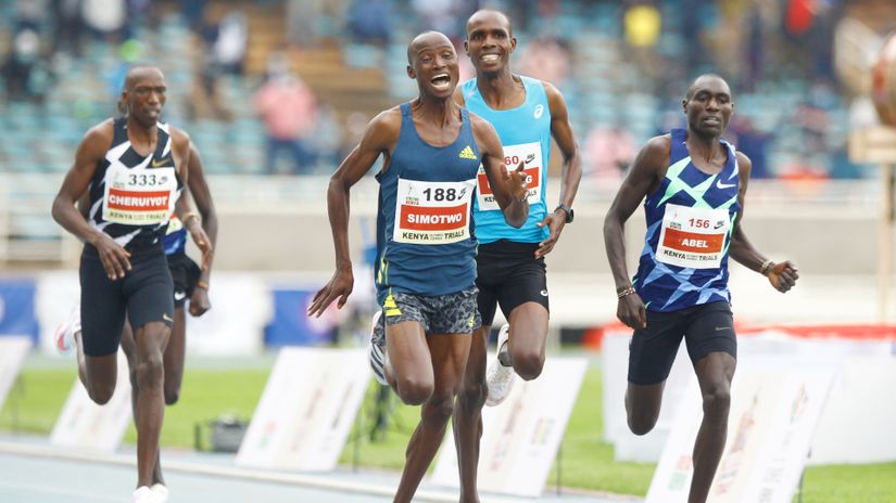 Abel Kipsang (156) crosses the line behind Charles Simotwo and Kamar Etyang during the national Athletics Kenya Olympics trials. 