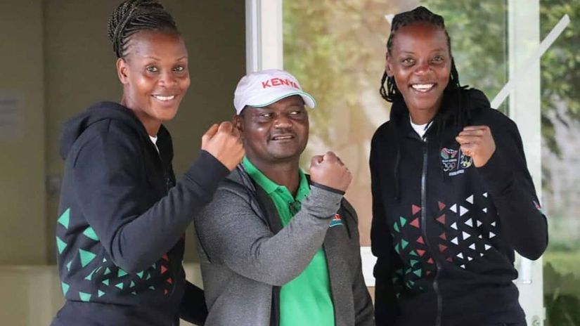 Sammy Mulinge (C) poses for a photo with Gaudencia Makokha and Brackcides Agala ahead of their departure to Tokyo.