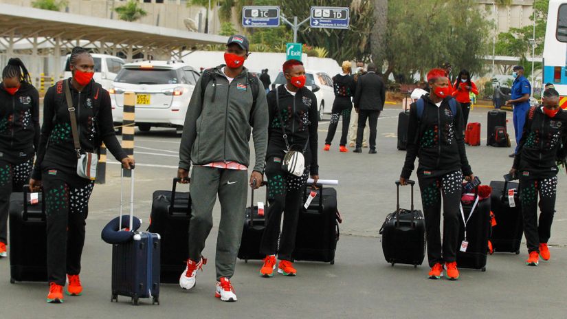 Members of the Malkia Strikers arrive for their departure led by Head Coach Paul Bitok for Tokyo 2020 Olympic games at Jomo Kenyatta International Airport in Nairobi on July 08, 2021