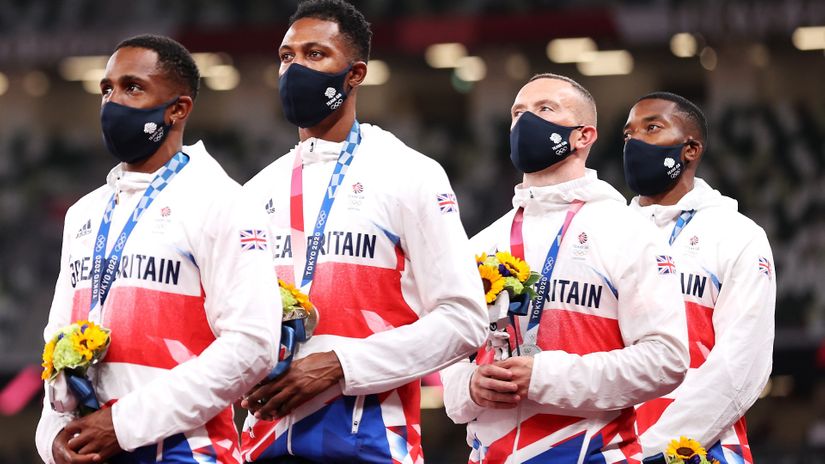 Ujah (the first on the left) with his colleagues in Tokyo (©Christian Petersen/Getty Images)