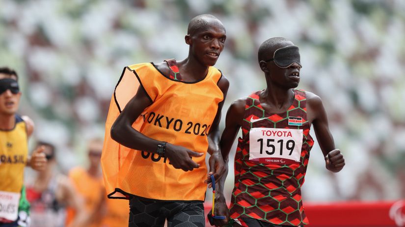 Rodgers Kiprop and guide Apha Malinga © Courtesy