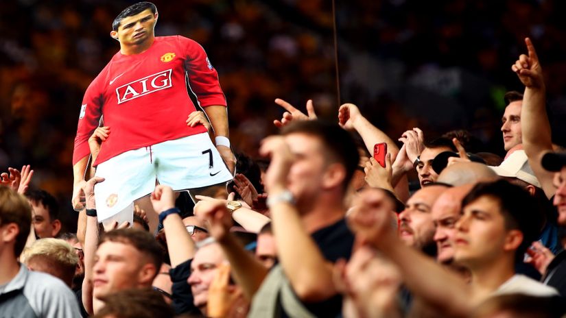 Man Utd fans hold up a life size cut out of Cristiano Ronaldo during the Wolverhampton tie (©Chris Brunskill/Fantasista/Getty Images)
