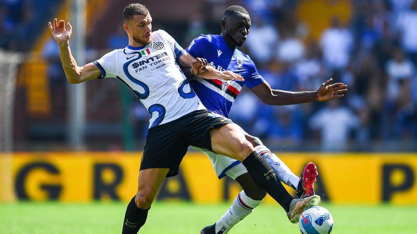 Edin Dzeko & Omar Colley of Gambia (©Gallo Images)
