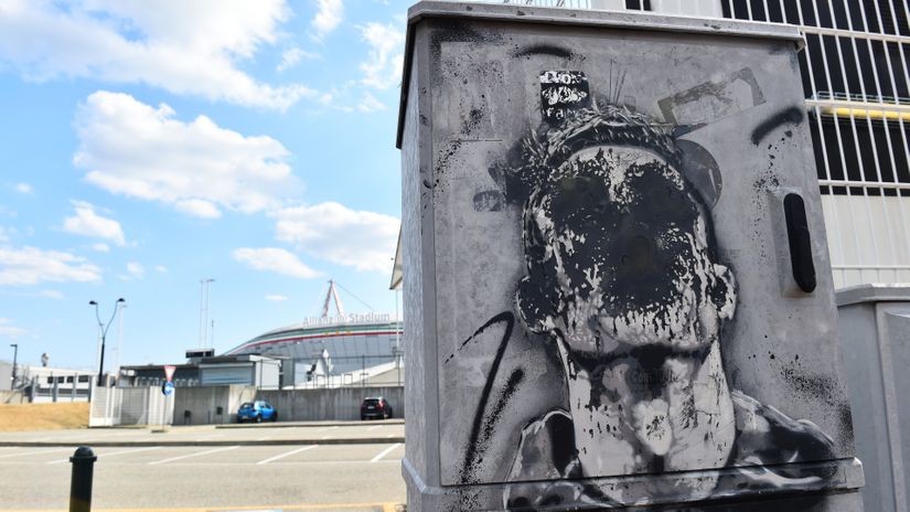 A ruined Cristiano Ronaldo mural near Juventus stadium (©REUTERS/Massimo Pinca)