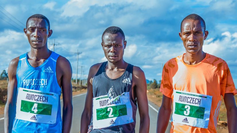Left to right: Weldon Langat, Philemon Kiplimo, Collins Koros pose for a photo © Courtesy