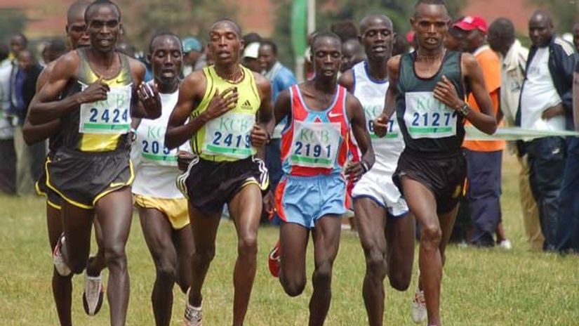 Macharinyaang' (2191) pictured with Eliud Kipchoge (left) and Agustine Choge (2nd left) in a past race. 