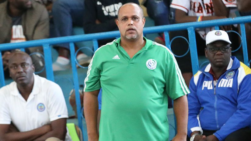 Sammy Kiki (C) reacts in a past match