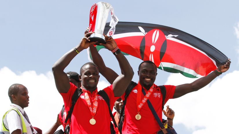 Andrew Amonde and Collins Injera display the Singapore 7s trophy they won back in 2015 © Mozzart Sport