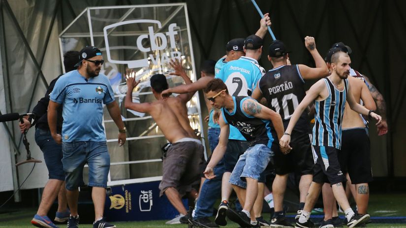 Gremio fans demolish the pitchside VAR monitor (©REUTERS/Diego Vara)