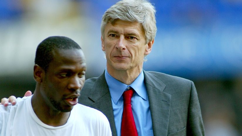 Wenger hugs Lauren back in 2004 (©Action Images / Alex Morton)