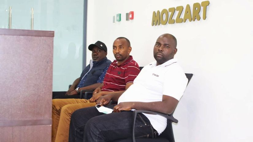 Agapitas Saikoli at Mozzart offices with other Omoka na Moti winners
