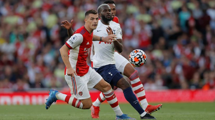 Granit Xhaka of Arsenal in front of Tanguy Ndombele of Spurs (©Tom Jenkins/Getty Images)