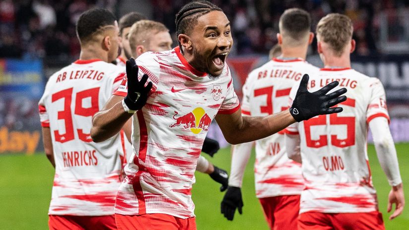 Nkunku celebrates after scoring (©Boris Streubel/Getty Images)