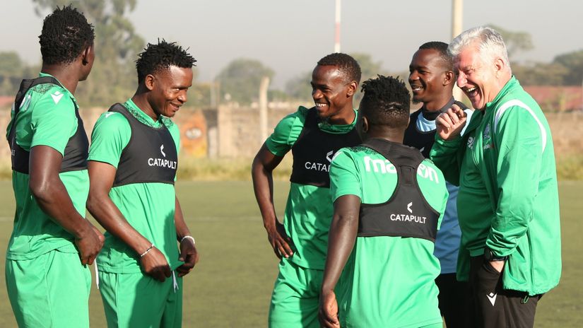 Players and coach Spier enjoying a light moment in training © Gor Mahia