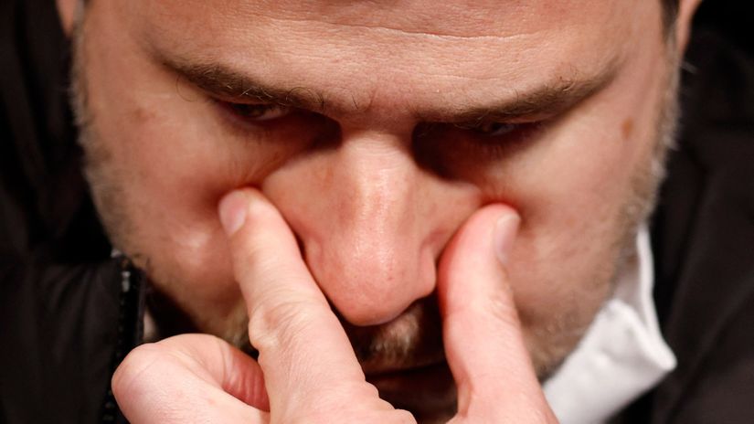 Pochettino touching his nose (©REUTERS/Gonzalo Fuentes)