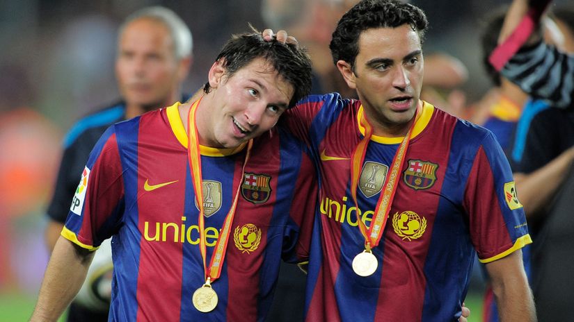 It would be like the good old days: Lionel Messi and Xavi Hernandez in 2010 (©AFP)