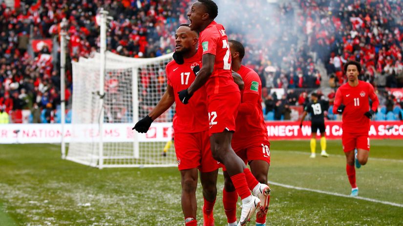 Canadian players celebrate against Jamaica (©Vaughn Ridley/Getty Images)