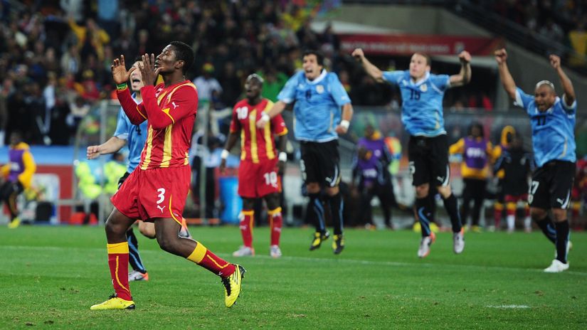 Asamoah Gyan of Ghana reacts as he misses a late penalty kick in extra time to win the match during the 2010 FIFA World Cup South Africa Quarter Final (©Clive Mason/Getty Images)
