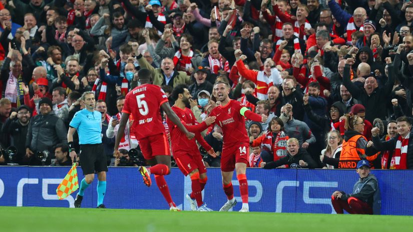 Hendo celebrates with Salah and Konate after scoring against Villareal on Wednesday night (©Catherine Ivill/Getty Images)