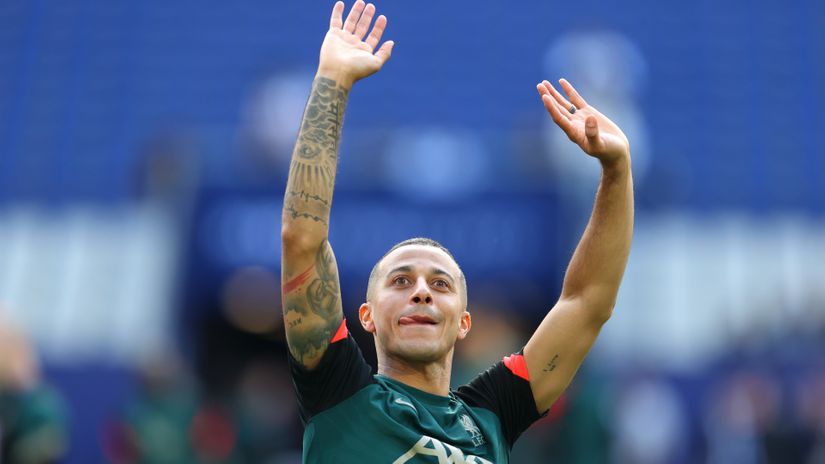 Thiago Alcantara greets someone in the stands of Stade de France in Paris on Friday (© Catherine Ivill/Getty Images)